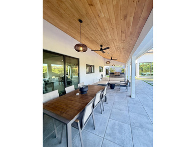 Exceptional modern residence fully renovated with a 1,700 - on Seagate Country Club in Florida - for sale on GolfHomes.com, golf home, golf lot