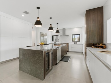 Exceptional modern residence fully renovated with a 1,700 - on Seagate Country Club in Florida - for sale on GolfHomes.com, golf home, golf lot