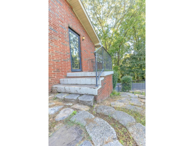 This all brick rancher with a finished basement is only minutes on Concord Golf Club in Tennessee - for sale on GolfHomes.com, golf home, golf lot
