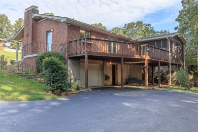 This all brick rancher with a finished basement is only minutes on Concord Golf Club in Tennessee - for sale on GolfHomes.com, golf home, golf lot