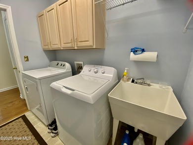 Don't miss the opportunity to move into one of the most on Sandpiper Bay Golf and Country Club in North Carolina - for sale on GolfHomes.com, golf home, golf lot