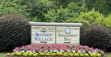 Don't miss the opportunity to move into one of the most on Sandpiper Bay Golf and Country Club in North Carolina - for sale on GolfHomes.com, golf home, golf lot