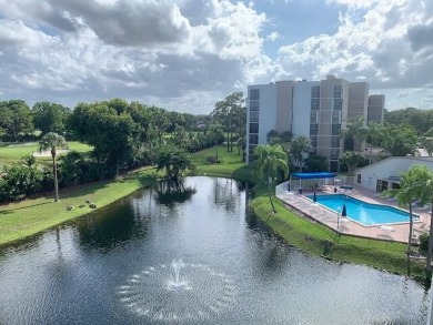 Beautifully renovated home with an amazing lake and golf view in on The Country Club At Boca Raton in Florida - for sale on GolfHomes.com, golf home, golf lot