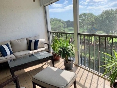 Beautifully renovated home with an amazing lake and golf view in on The Country Club At Boca Raton in Florida - for sale on GolfHomes.com, golf home, golf lot