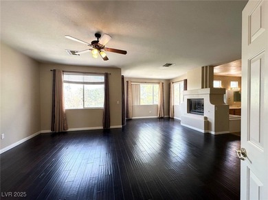 Golf course community, Guard gated. Vault ceiling, travertine on Rhodes Ranch Golf Club in Nevada - for sale on GolfHomes.com, golf home, golf lot
