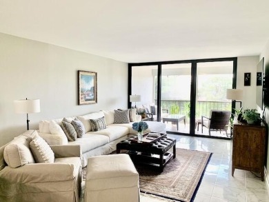 Beautifully renovated home with an amazing lake and golf view in on The Country Club At Boca Raton in Florida - for sale on GolfHomes.com, golf home, golf lot