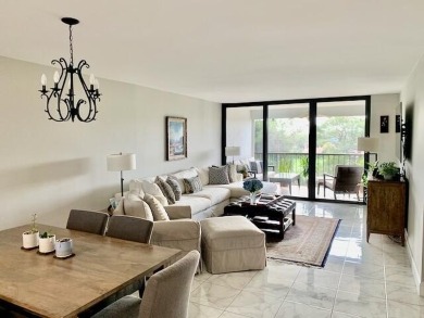 Beautifully renovated home with an amazing lake and golf view in on The Country Club At Boca Raton in Florida - for sale on GolfHomes.com, golf home, golf lot