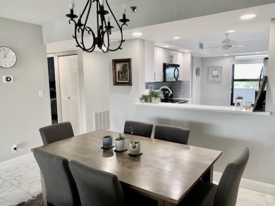 Beautifully renovated home with an amazing lake and golf view in on The Country Club At Boca Raton in Florida - for sale on GolfHomes.com, golf home, golf lot