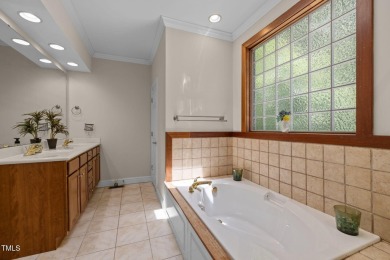 Welcome to this exquisite 5-bedroom 3-bath family home in the on Henderson Country Club in North Carolina - for sale on GolfHomes.com, golf home, golf lot