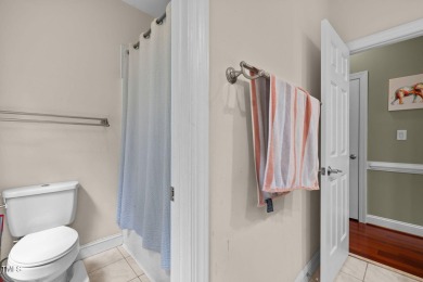 Welcome to this exquisite 5-bedroom 3-bath family home in the on Henderson Country Club in North Carolina - for sale on GolfHomes.com, golf home, golf lot