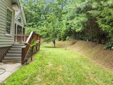 Welcome to this exquisite 5-bedroom 3-bath family home in the on Henderson Country Club in North Carolina - for sale on GolfHomes.com, golf home, golf lot