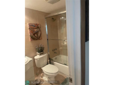 LOCATED IN THE HEART OF PEMBROKE PINES. THIS 2BR/2BA   UNIT IS on Hollybrook Golf and Tennis Club  in Florida - for sale on GolfHomes.com, golf home, golf lot
