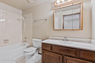 Discover this stunning 4-bedroom, 2-bathroom condo in Twin Lakes on Twin Lakes Village Golf Course in Idaho - for sale on GolfHomes.com, golf home, golf lot