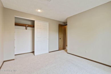 Discover this stunning 4-bedroom, 2-bathroom condo in Twin Lakes on Twin Lakes Village Golf Course in Idaho - for sale on GolfHomes.com, golf home, golf lot