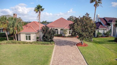 Mediterranean Estate with Marsh Views & Saltwater Pool in a on Marsh Valley Country Club in Florida - for sale on GolfHomes.com, golf home, golf lot