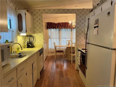 This home is full of love! Cozy and comfortable, fully furnished on Indianwood Golf and Country Club in Florida - for sale on GolfHomes.com, golf home, golf lot