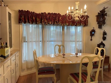 This home is full of love! Cozy and comfortable, fully furnished on Indianwood Golf and Country Club in Florida - for sale on GolfHomes.com, golf home, golf lot