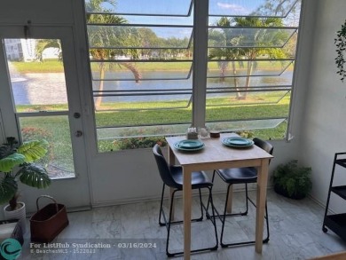 Beautifully remodeled 1st floor 1 bedroom 2 full baths, one with on Hillsboro Pines Golf in Florida - for sale on GolfHomes.com, golf home, golf lot