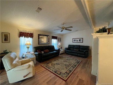 This home is full of love! Cozy and comfortable, fully furnished on Indianwood Golf and Country Club in Florida - for sale on GolfHomes.com, golf home, golf lot
