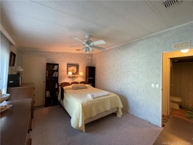 This home is full of love! Cozy and comfortable, fully furnished on Indianwood Golf and Country Club in Florida - for sale on GolfHomes.com, golf home, golf lot