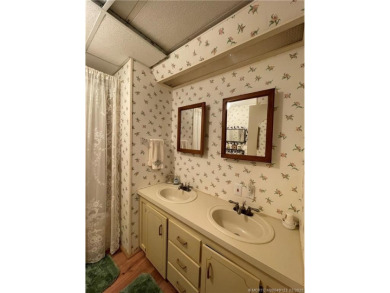 This home is full of love! Cozy and comfortable, fully furnished on Indianwood Golf and Country Club in Florida - for sale on GolfHomes.com, golf home, golf lot