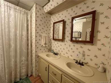 This home is full of love! Cozy and comfortable, fully furnished on Indianwood Golf and Country Club in Florida - for sale on GolfHomes.com, golf home, golf lot