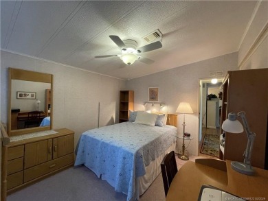 This home is full of love! Cozy and comfortable, fully furnished on Indianwood Golf and Country Club in Florida - for sale on GolfHomes.com, golf home, golf lot