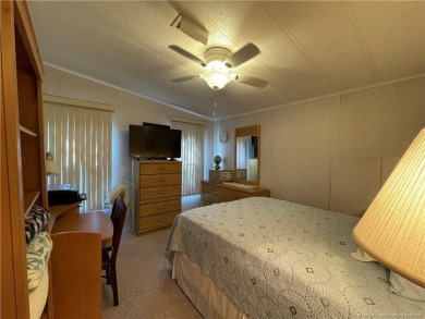 This home is full of love! Cozy and comfortable, fully furnished on Indianwood Golf and Country Club in Florida - for sale on GolfHomes.com, golf home, golf lot