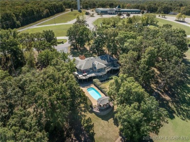 This spacious and inviting home, perfect for entertaining, sits on Indian Rock Golf Club in Missouri - for sale on GolfHomes.com, golf home, golf lot