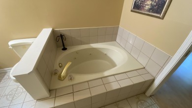 Welcome to resort-style living in the highly sought-after gated on Lakes of the Four Seasons Country Club in Indiana - for sale on GolfHomes.com, golf home, golf lot