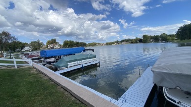 Welcome to resort-style living in the highly sought-after gated on Lakes of the Four Seasons Country Club in Indiana - for sale on GolfHomes.com, golf home, golf lot