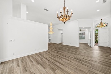 Elegantly and completely remodeled estate home with expansive on PGA National Golf Club in Florida - for sale on GolfHomes.com, golf home, golf lot