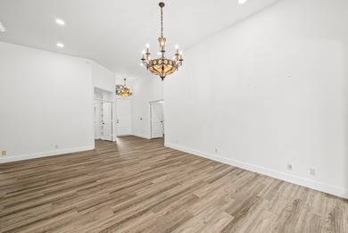 Elegantly and completely remodeled estate home with expansive on PGA National Golf Club in Florida - for sale on GolfHomes.com, golf home, golf lot