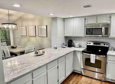 Recently renovated townhome with a bright, modern and open floor on Rumbling Bald Resort on Lake Lure in North Carolina - for sale on GolfHomes.com, golf home, golf lot