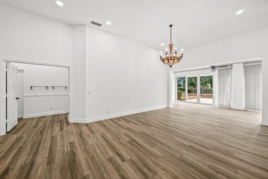 Elegantly and completely remodeled estate home with expansive on PGA National Golf Club in Florida - for sale on GolfHomes.com, golf home, golf lot