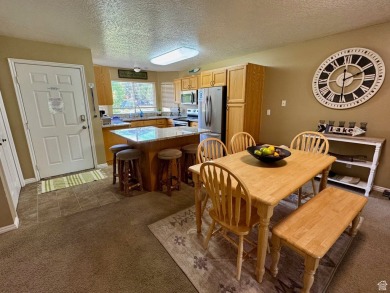 Upper Level south-end unit at Harbor Village in Tennis Building on Bear Lake Golf Course in Utah - for sale on GolfHomes.com, golf home, golf lot