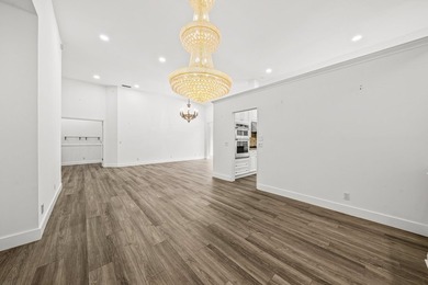 Elegantly and completely remodeled estate home with expansive on PGA National Golf Club in Florida - for sale on GolfHomes.com, golf home, golf lot