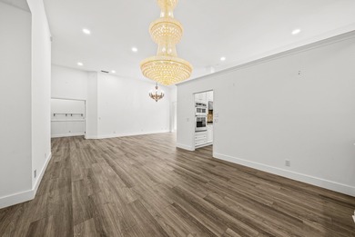 Elegantly and completely remodeled estate home with expansive on PGA National Golf Club in Florida - for sale on GolfHomes.com, golf home, golf lot