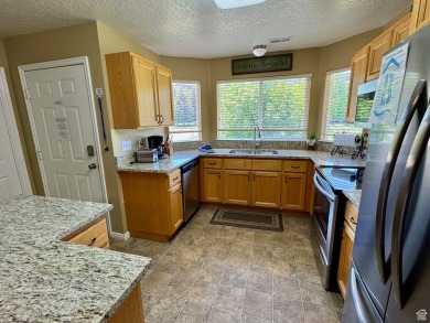 Upper Level south-end unit at Harbor Village in Tennis Building on Bear Lake Golf Course in Utah - for sale on GolfHomes.com, golf home, golf lot