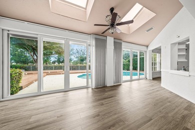 Elegantly and completely remodeled estate home with expansive on PGA National Golf Club in Florida - for sale on GolfHomes.com, golf home, golf lot