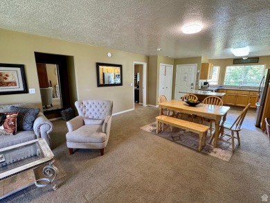 Upper Level south-end unit at Harbor Village in Tennis Building on Bear Lake Golf Course in Utah - for sale on GolfHomes.com, golf home, golf lot