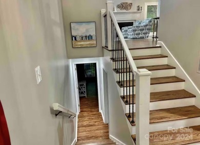 Recently renovated townhome with a bright, modern and open floor on Rumbling Bald Resort on Lake Lure in North Carolina - for sale on GolfHomes.com, golf home, golf lot