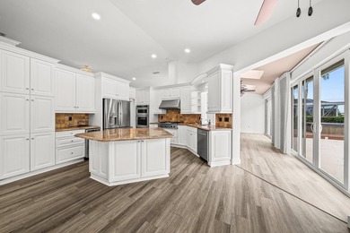 Elegantly and completely remodeled estate home with expansive on PGA National Golf Club in Florida - for sale on GolfHomes.com, golf home, golf lot