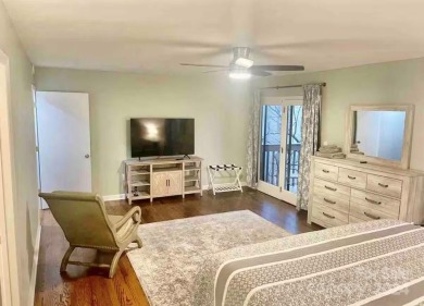 Recently renovated townhome with a bright, modern and open floor on Rumbling Bald Resort on Lake Lure in North Carolina - for sale on GolfHomes.com, golf home, golf lot