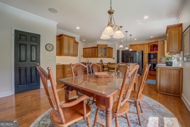 This stunning home offers the perfect blend of elegance, comfort on Indian Creek Golf Club in Georgia - for sale on GolfHomes.com, golf home, golf lot