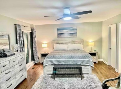 Recently renovated townhome with a bright, modern and open floor on Rumbling Bald Resort on Lake Lure in North Carolina - for sale on GolfHomes.com, golf home, golf lot