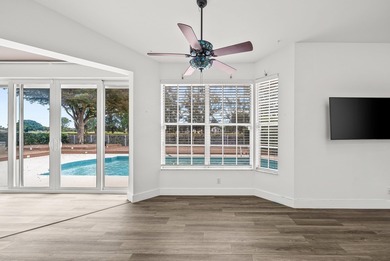 Elegantly and completely remodeled estate home with expansive on PGA National Golf Club in Florida - for sale on GolfHomes.com, golf home, golf lot