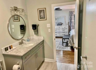 Recently renovated townhome with a bright, modern and open floor on Rumbling Bald Resort on Lake Lure in North Carolina - for sale on GolfHomes.com, golf home, golf lot