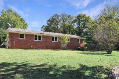 Adorable 3 bedroom home located on a large corner lot within on Mayfield-Graves Country Club in Kentucky - for sale on GolfHomes.com, golf home, golf lot