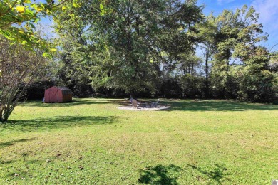 Adorable 3 bedroom home located on a large corner lot within on Mayfield-Graves Country Club in Kentucky - for sale on GolfHomes.com, golf home, golf lot